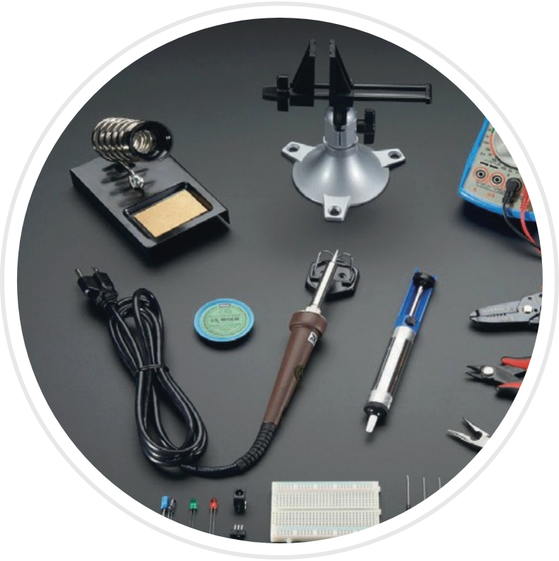 portable soldering iron with a breadboard and LEDs