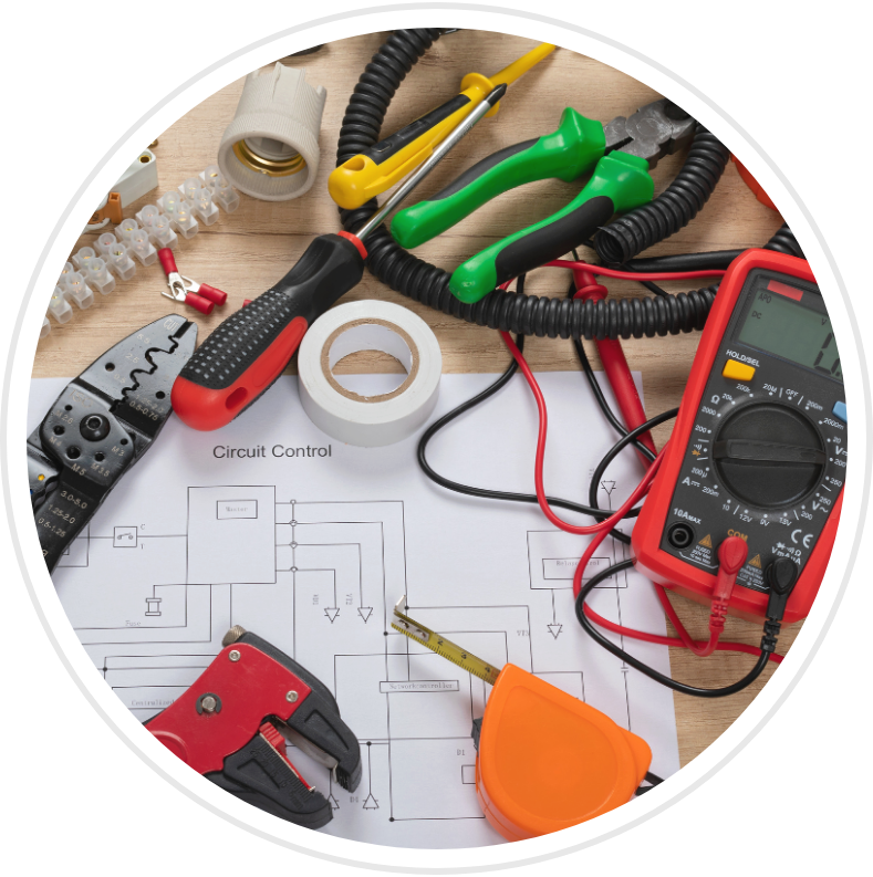 a voltmeter with a measuring tape and pliers